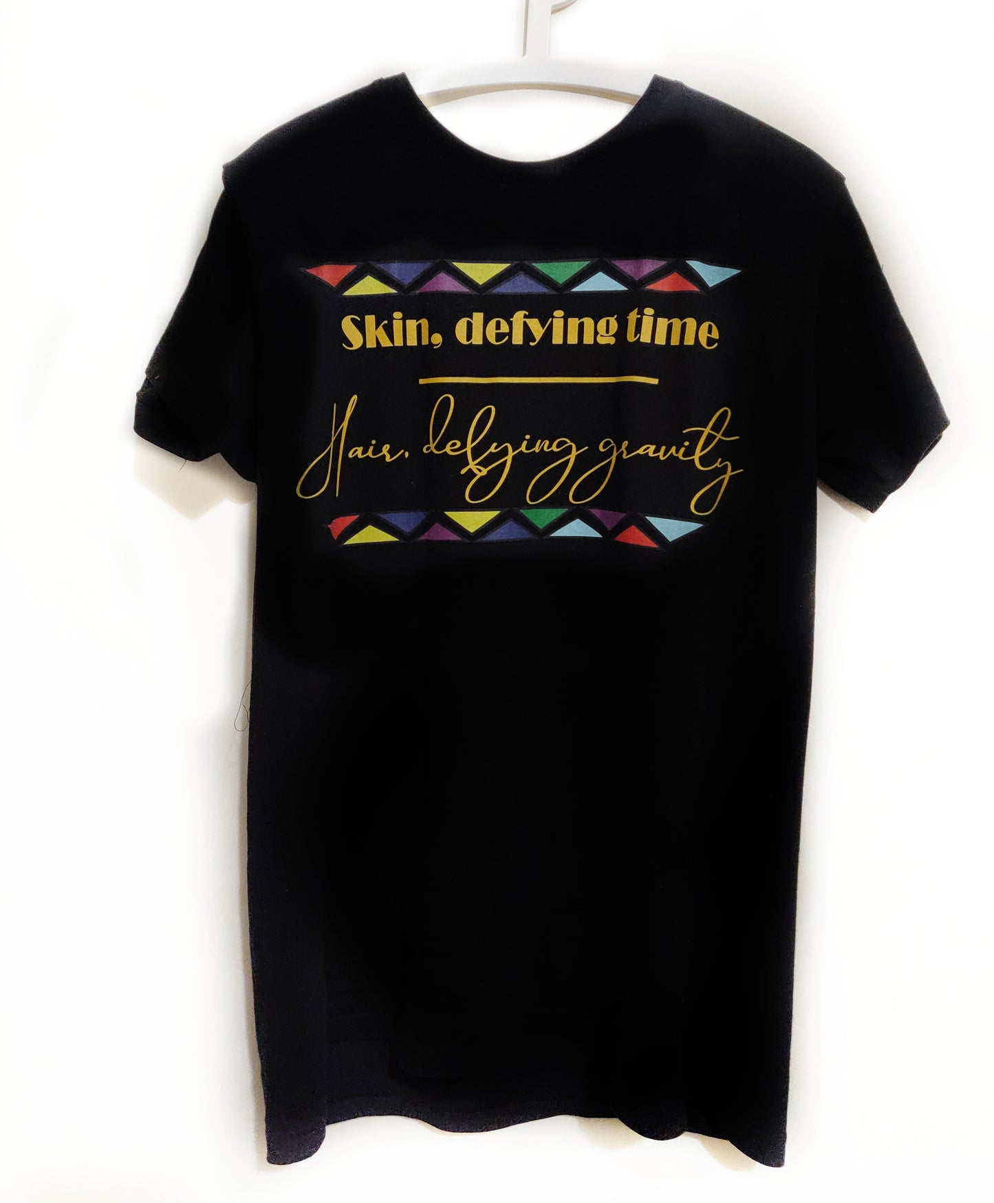 Skin defying time, Hair defying gravity T-Shirt