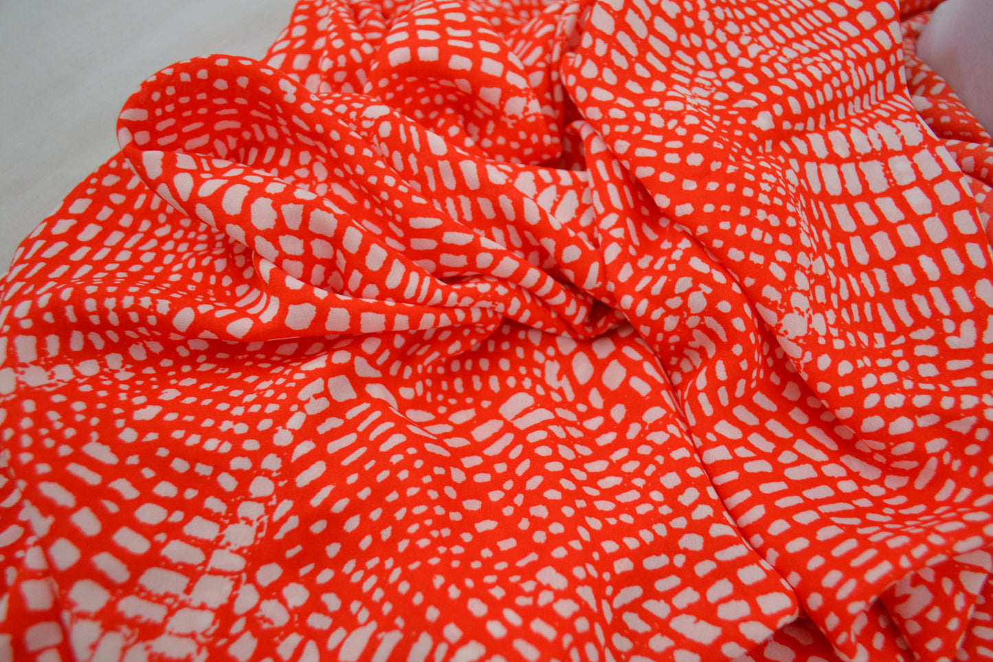 Orange and off white Georgette Crepe Fabric